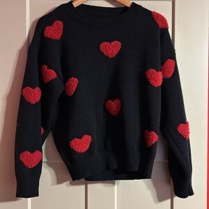Black with red heart sweater size small
